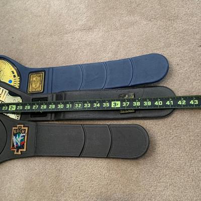 LOT 69 A: Children's Foam WCW & 1998 & 1999 Jakks WWF Replica Belts