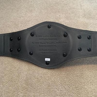 LOT 69 A: Children's Foam WCW & 1998 & 1999 Jakks WWF Replica Belts