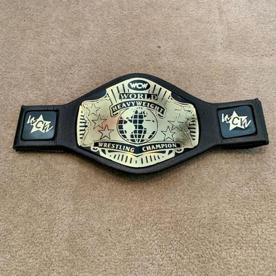 LOT 69 A: Children's Foam WCW & 1998 & 1999 Jakks WWF Replica Belts