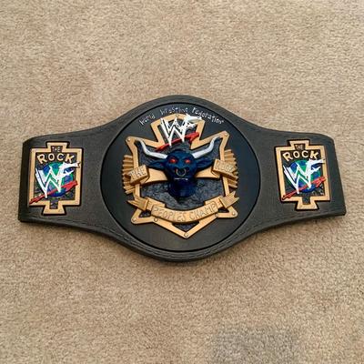 LOT 69 A: Children's Foam WCW & 1998 & 1999 Jakks WWF Replica Belts