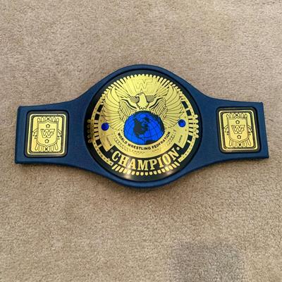 LOT 69 A: Children's Foam WCW & 1998 & 1999 Jakks WWF Replica Belts