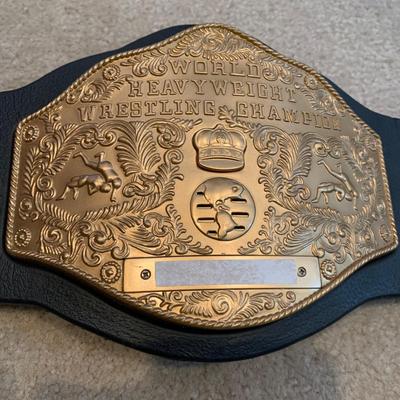 LOT 71 A: Children's Foam WCW & WWF Replica Belts