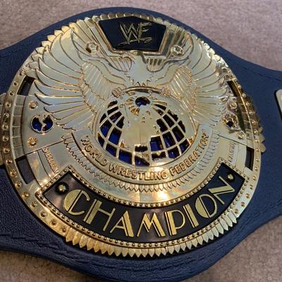 LOT 71 A: Children's Foam WCW & WWF Replica Belts