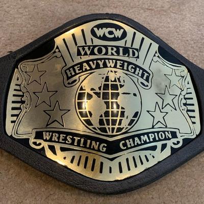 LOT 71 A: Children's Foam WCW & WWF Replica Belts