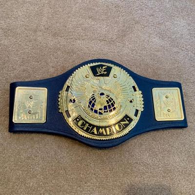 LOT 71 A: Children's Foam WCW & WWF Replica Belts
