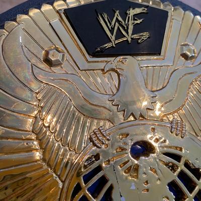 LOT 71 A: Children's Foam WCW & WWF Replica Belts