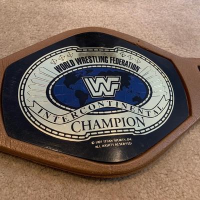 LOT 71 A: Children's Foam WCW & WWF Replica Belts