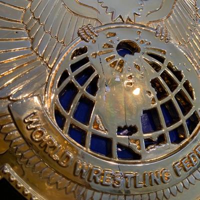 LOT 71 A: Children's Foam WCW & WWF Replica Belts