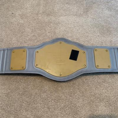 LOT 71 A: Children's Foam WCW & WWF Replica Belts