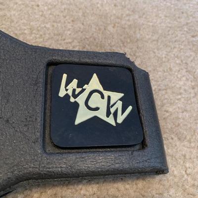 LOT 71 A: Children's Foam WCW & WWF Replica Belts