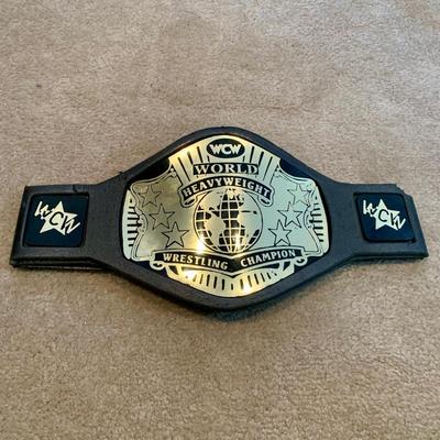 LOT 71 A: Children's Foam WCW & WWF Replica Belts