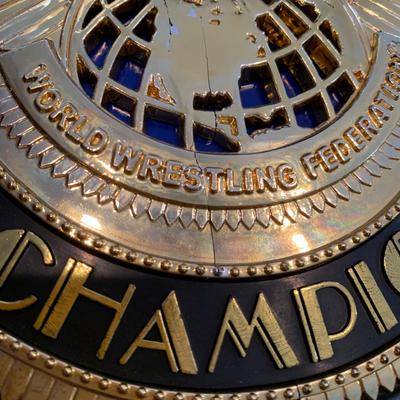 LOT 71 A: Children's Foam WCW & WWF Replica Belts