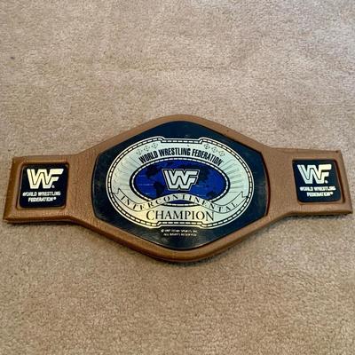 LOT 71 A: Children's Foam WCW & WWF Replica Belts