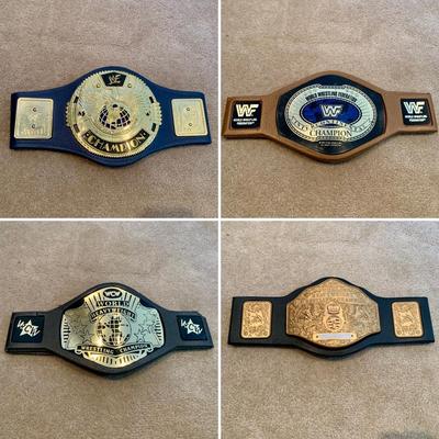 LOT 71 A: Children's Foam WCW & WWF Replica Belts