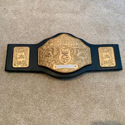 LOT 71 A: Children's Foam WCW & WWF Replica Belts