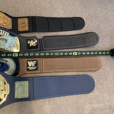 LOT 71 A: Children's Foam WCW & WWF Replica Belts