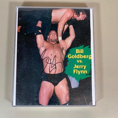 LOT 75 A: WWF Collection: Slam Cam, Posters, & More