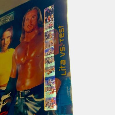 LOT 75 A: WWF Collection: Slam Cam, Posters, & More