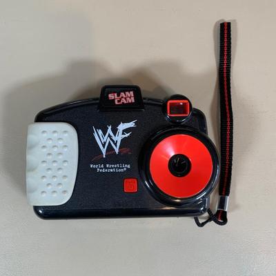 LOT 75 A: WWF Collection: Slam Cam, Posters, & More