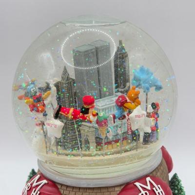 LOT 96A: Musical Snowglobes - Disney USA "Yankee Doodle" & 2000 Macy's Thanksgiving Day Parade