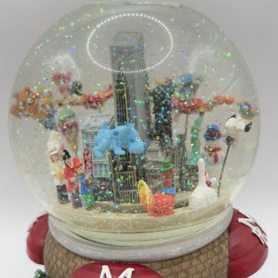 LOT 96A: Musical Snowglobes - Disney USA "Yankee Doodle" & 2000 Macy's Thanksgiving Day Parade
