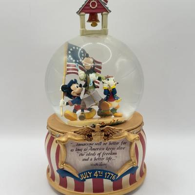 LOT 96A: Musical Snowglobes - Disney USA "Yankee Doodle" & 2000 Macy's Thanksgiving Day Parade