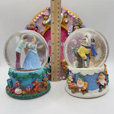 LOT 97A: Disney Princess Collection - Enesco Christmas Musical Snowglobes (Snow White & Cinderella) & Photo Frame
