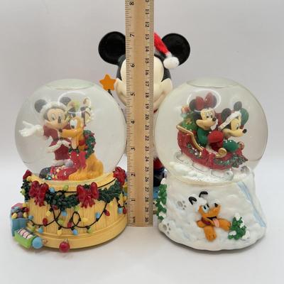 LOT 103B: Disney Kurt S Adler Mickey as Santa Christmas Nutcracker & Disney Christmas Snowglobes - "Sleigh Ride" &...
