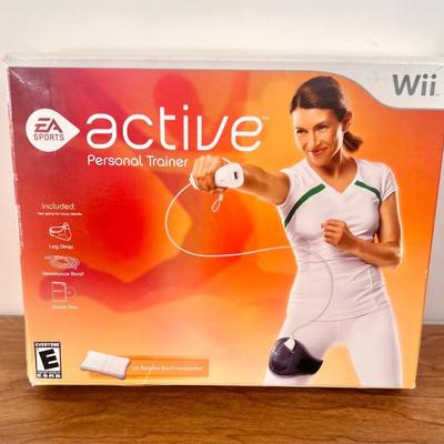 LOT 142B: Wii Fit Accessories: Dumbbells, EA Sports Active Personal Trainer & Your Shape Featuring Jenny McCarthy
