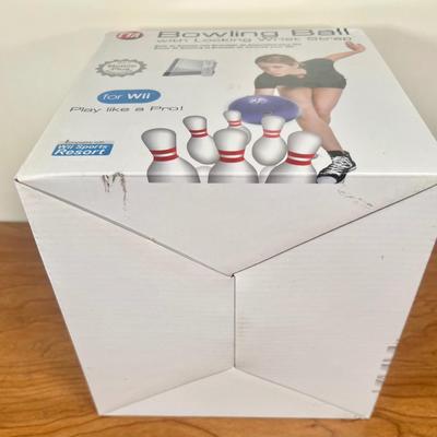 LOT 144B: Wii Sports Accessories: Bowling Ball, Nerf Sports & More