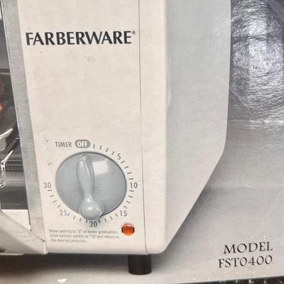 LOT 148B: NIB Faberware Special Select Toaster Oven Model FST0400
