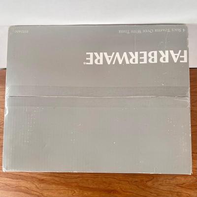 LOT 148B: NIB Faberware Special Select Toaster Oven Model FST0400