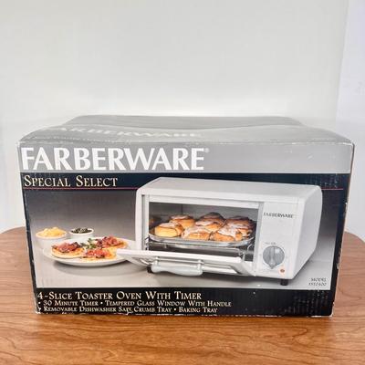 LOT 148B: NIB Faberware Special Select Toaster Oven Model FST0400