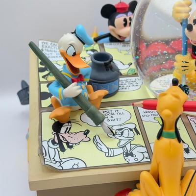 LOT 168B: Disney Mickey & Friends Comic Strip “Mickey Mouse March” Musical Snowglobe