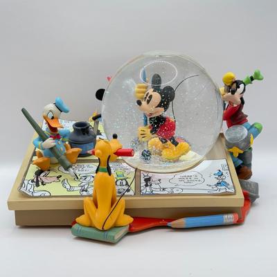LOT 168B: Disney Mickey & Friends Comic Strip “Mickey Mouse March” Musical Snowglobe
