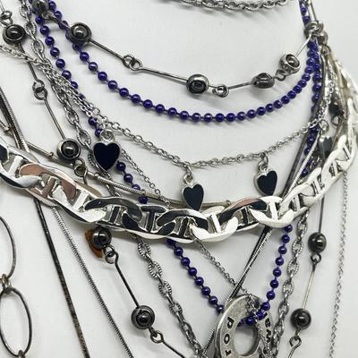 LOT 183J: Eclectic Silvertone Necklace Collection: Playboy Bunny, Rod Stewart, Liberty Bell and More