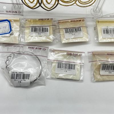 LOT 184J: New in Package Earrings