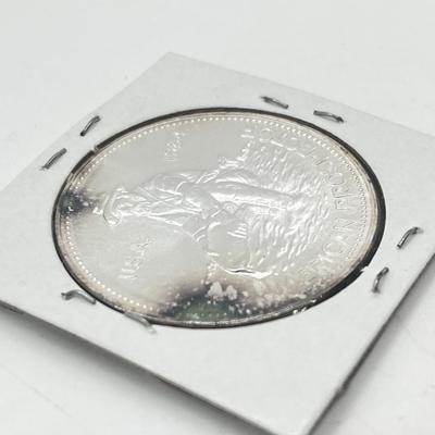 LOT 196J: 1984 Englehard One Ounce .999 Fine Silver American Prospector Coin