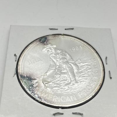 LOT 196J: 1984 Englehard One Ounce .999 Fine Silver American Prospector Coin