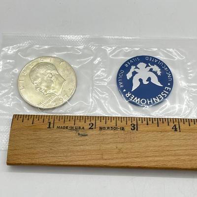 LOT 205J: 1974 Eisenhower Uncirculated Silver Dollar