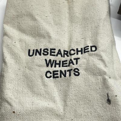 LOT 221J: US Currency Collection: 1957 $1 Silver Certificate, 1980 Susan B. Anthony Souvenir Set, 1997 Coin Set, Bag of Wheat Pennies