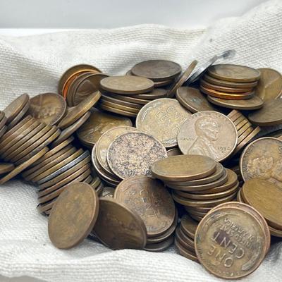 LOT 221J: US Currency Collection: 1957 $1 Silver Certificate, 1980 Susan B. Anthony Souvenir Set, 1997 Coin Set, Bag of Wheat Pennies