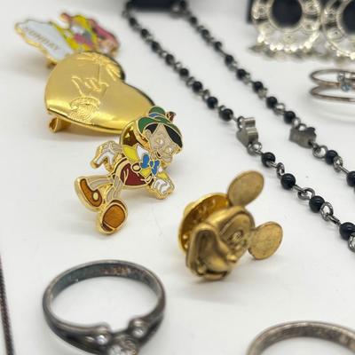 LOT 235J: Disney Jewelry Collection Including Sterling Rings Sizes 5-6-8