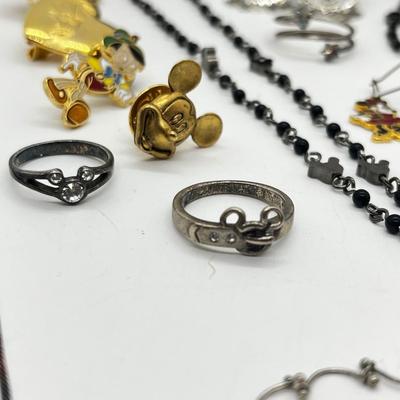 LOT 235J: Disney Jewelry Collection Including Sterling Rings Sizes 5-6-8