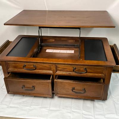 Lot P 656 Four Drawer Wooden Coffee Table with Elevating Table Top