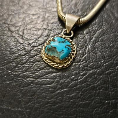 Signed Sterling Silver Necklace with a Turquoise Signed Pendant