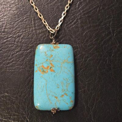 Sterling Silver Necklace with a Large Turquoise Pendant