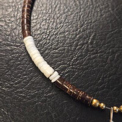 Vintage Heishi Necklace with a Tooth Pendant