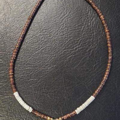 Vintage Heishi Necklace with a Tooth Pendant