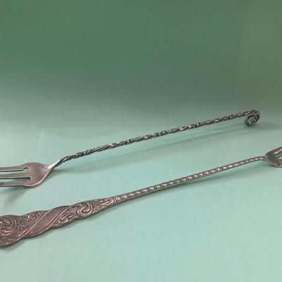 Long Twisted Sterling Forks E. Howard & Another